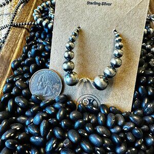 Gorgeous Graduated Authentic Sterling Silver Navajo Pearl dangle earrings